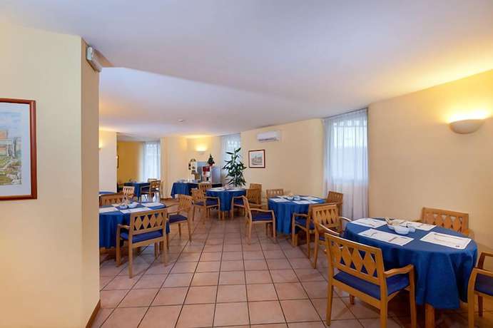 Imagen del bar/restaurante del Hotel Parco De Medici Residence. Foto 9