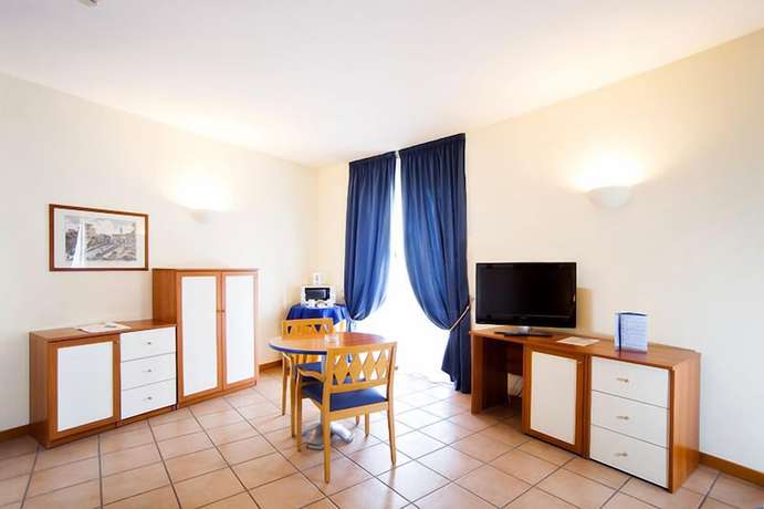 Imagen de la habitación del Hotel Parco De Medici Residence. Foto 10