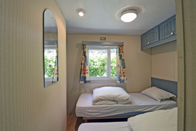 Imagen de la habitación del Hotel Parco Delle Piscine - Campground. Foto 10