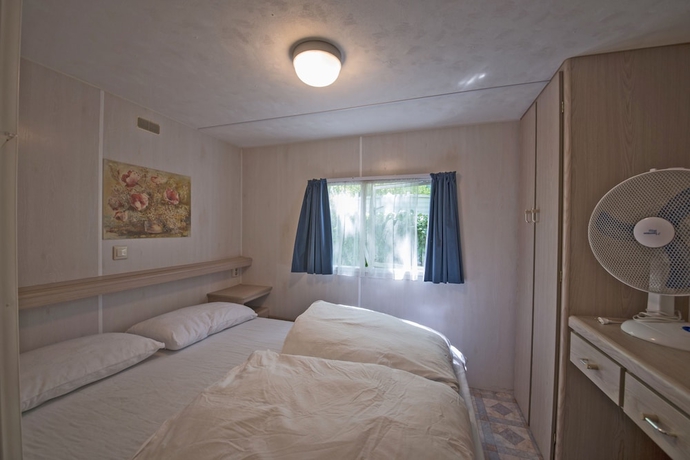 Imagen de la habitación del Hotel Parco Delle Piscine - Campground. Foto 11