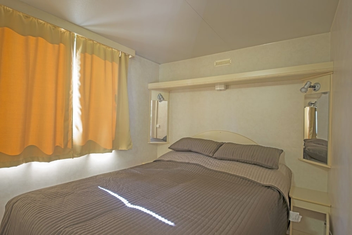 Imagen de la habitación del Hotel Parco Delle Piscine - Campground. Foto 16