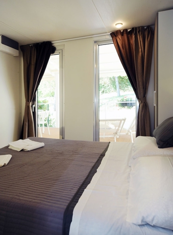 Imagen de la habitación del Hotel Parco Delle Piscine - Campground. Foto 19