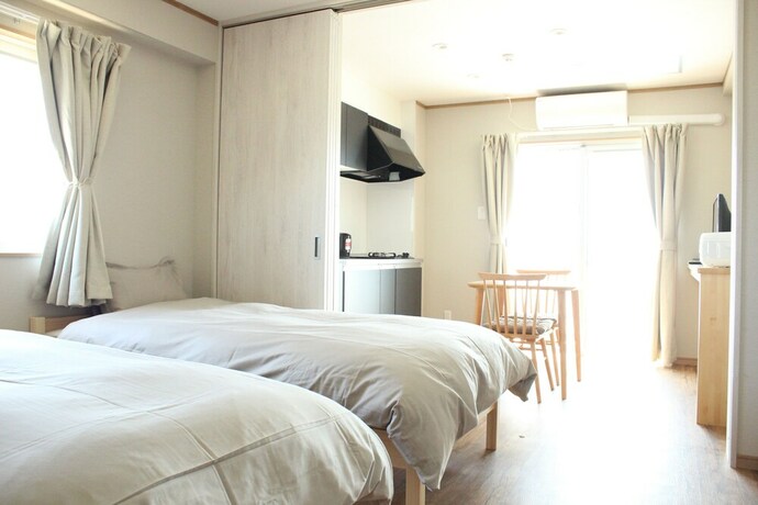 Imagen de la habitación del Hotel Parinaka Weekly. Foto 19
