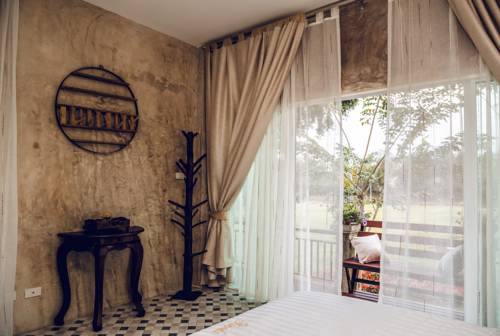 Imagen de la habitación del Hotel Parinda Garden Resort Spa & Yoga. Foto 11