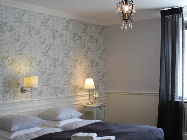 Imagen de la habitación del Hotel P&aring; Torvet. Foto 8