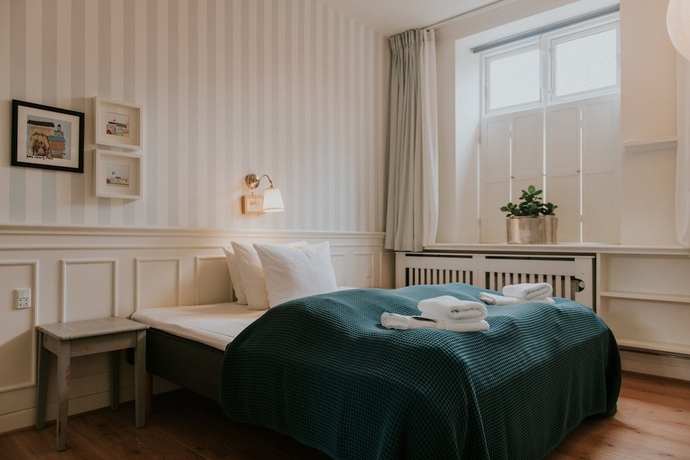 Imagen de la habitación del Hotel P&aring; Torvet. Foto 12