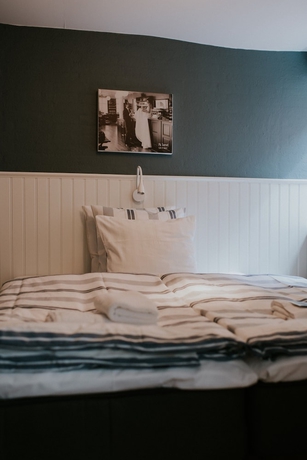 Imagen de la habitación del Hotel P&aring; Torvet. Foto 14