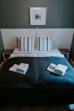 Imagen de la habitación del Hotel P&aring; Torvet. Foto 15