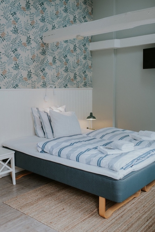 Imagen de la habitación del Hotel P&aring; Torvet. Foto 17