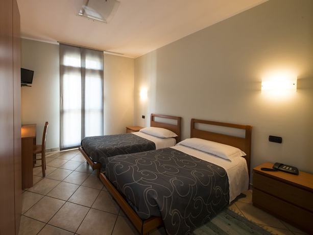 Imagen de la habitación del Hotel Parini. Foto 4