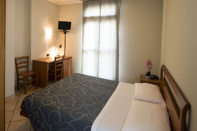 Imagen de la habitación del Hotel Parini. Foto 12