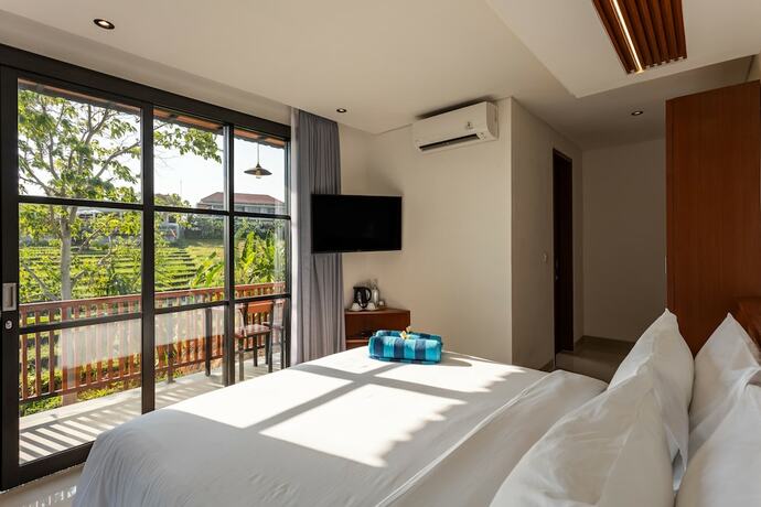 Imagen de la habitación del Hotel Paripadi Studio Canggu. Foto 16
