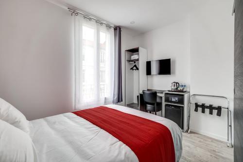 Imagen de la habitación del Hotel Paris, CLICHY. Foto 7