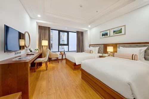 Imagen de la habitación del Hotel Paris Deli Danang Beach. Foto 7