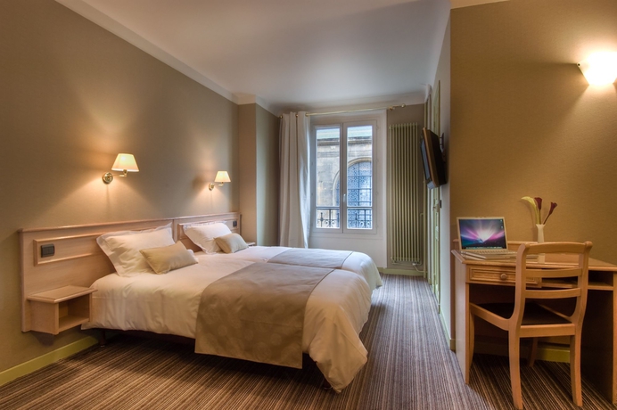 Imagen de la habitación del Hotel Paris France. Foto 3