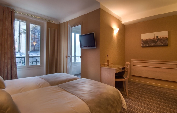 Imagen de la habitación del Hotel Paris France. Foto 5