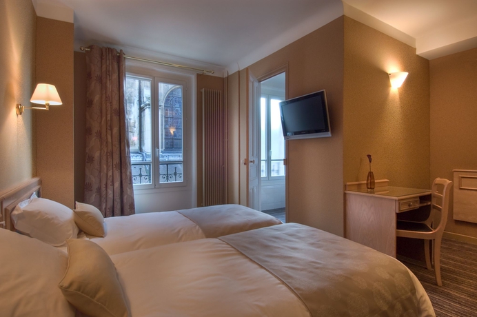 Imagen de la habitación del Hotel Paris France. Foto 7