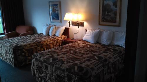 Imagen de la habitación del Hotel Paris Inn and Suites. Foto 7