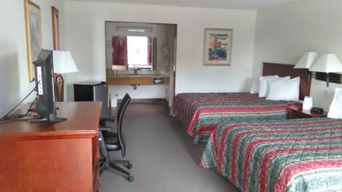 Imagen de la habitación del Hotel Paris Inn and Suites. Foto 8