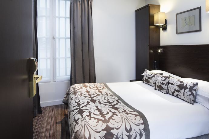 Imagen de la habitación del Hotel Paris Louvre Opéra. Foto 5