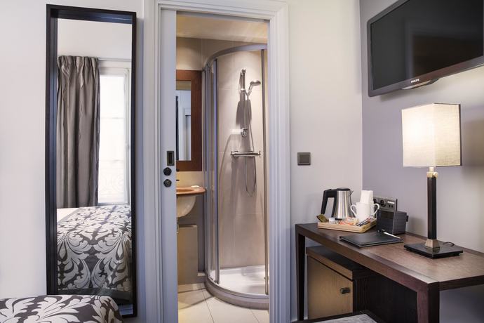 Imagen de la habitación del Hotel Paris Louvre Opéra. Foto 10
