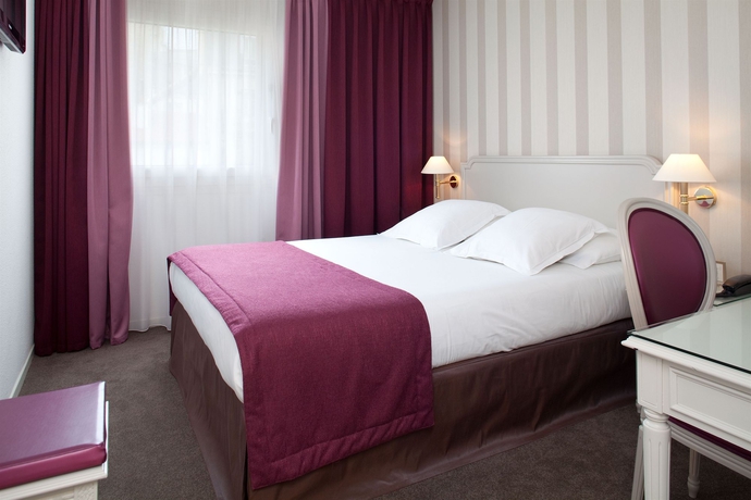 Imagen de la habitación del Hotel Paris Neuilly. Foto 10