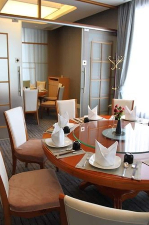 Imagen del bar/restaurante del Hotel Paris Pan-island. Foto 8