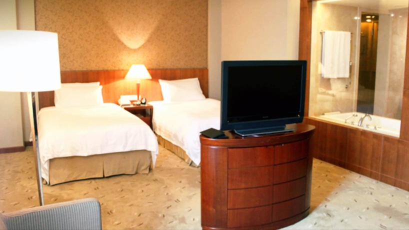 Imagen de la habitación del Hotel Paris Pan-island. Foto 18