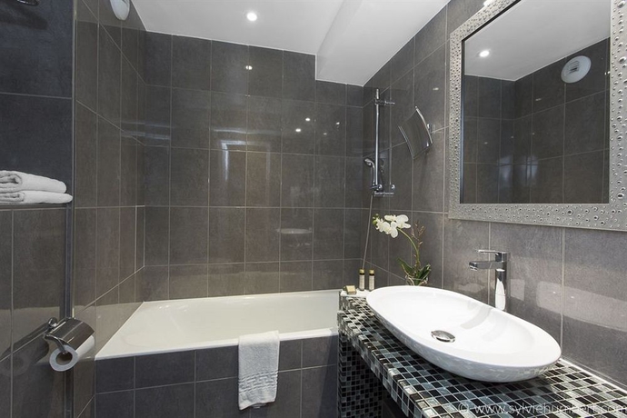 Imagen de la habitación del Hotel Paris Rivoli. Foto 16