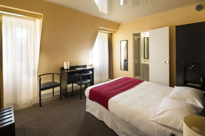 Imagen de la habitación del Hotel Paris Vaugirard. Foto 7