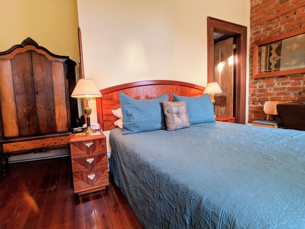 Imagen de la habitación del Hotel Parisian Courtyard Inn. Foto 8