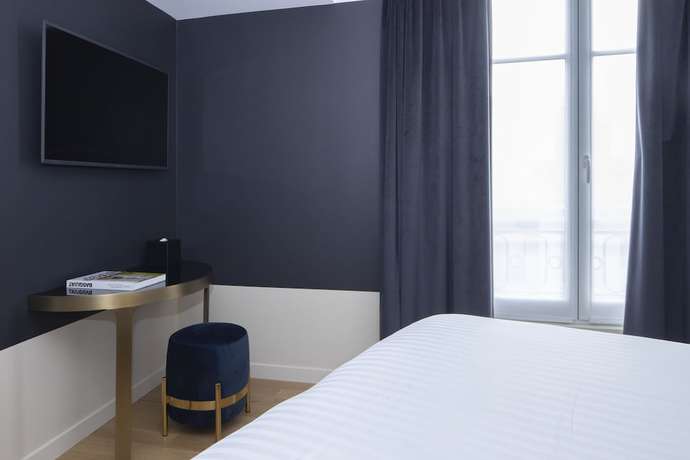 Imagen de la habitación del Hotel Parisianer. Foto 4