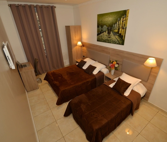 Imagen de la habitación del Hotel Parisien, Niza. Foto 11