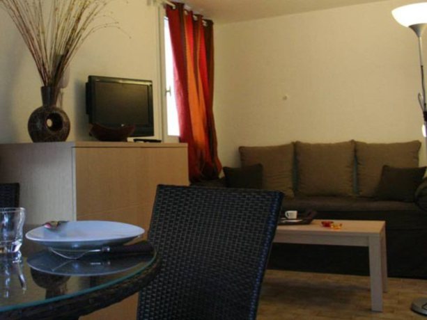 Imagen de la habitación del Hotel Park And Suites Village Cannes Mandelieu. Foto 5