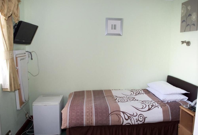 Imagen de la habitación del Hotel Park Avenue, Londres. Foto 10