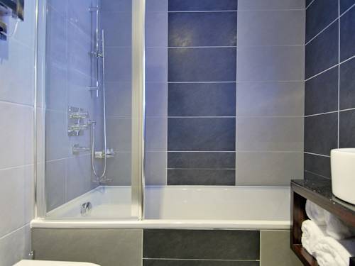 Imagen de la habitación del Hotel Park Grand Mayfair. Foto 14