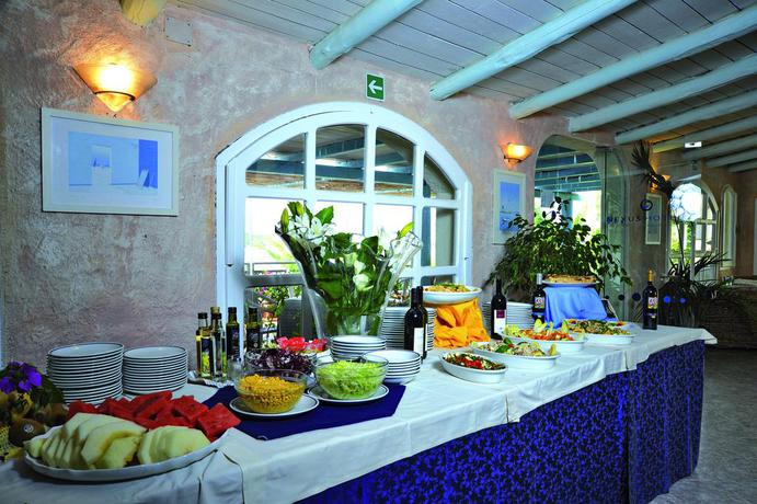 Imagen del bar/restaurante del Hotel Park Hotel (Baia Sardinia). Foto 3
