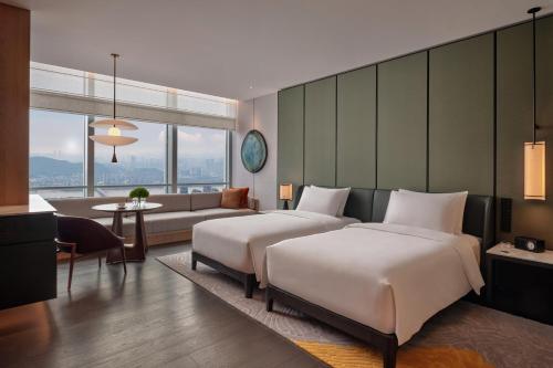 Imagen de la habitación del Hotel Park Hyatt Changsha. Foto 4