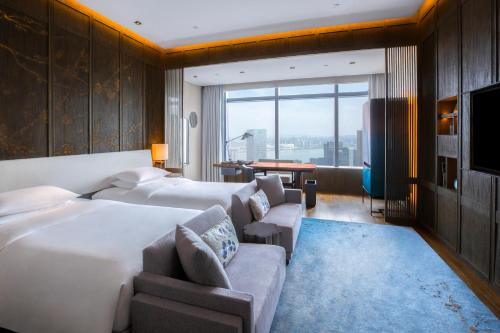 Imagen de la habitación del Hotel Park Hyatt Hangzhou. Foto 13