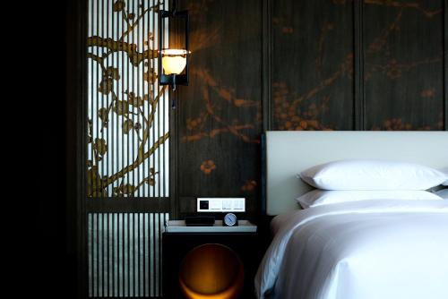Imagen de la habitación del Hotel Park Hyatt Hangzhou. Foto 20