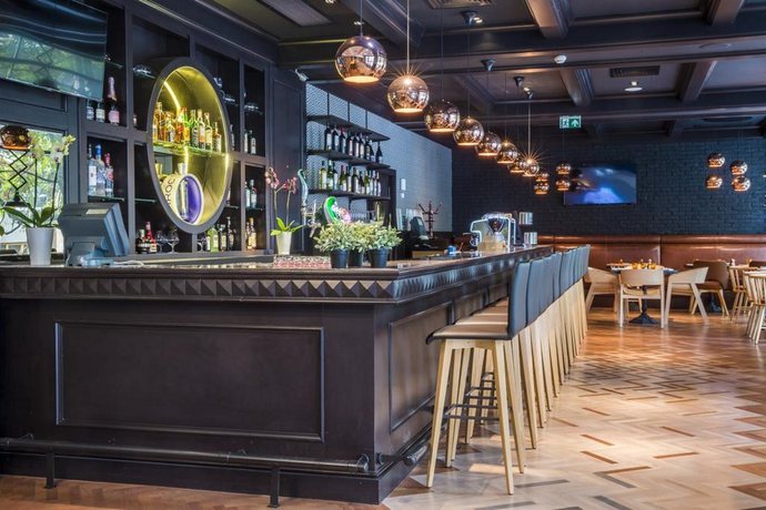 Imagen del bar/restaurante del Hotel Park Inn By Radisson Bucharest and Residence. Foto 4