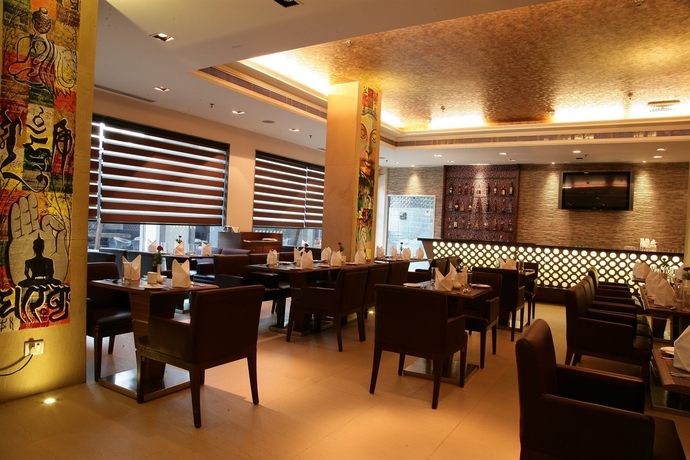 Imagen del bar/restaurante del Hotel Park Inn By Radisson New Delhi Lajpat Nagar. Foto 1