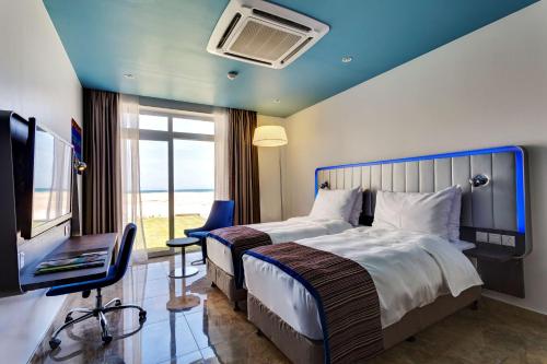 Imagen de la habitación del Hotel Park Inn By Radisson and Residence Duqm. Foto 15