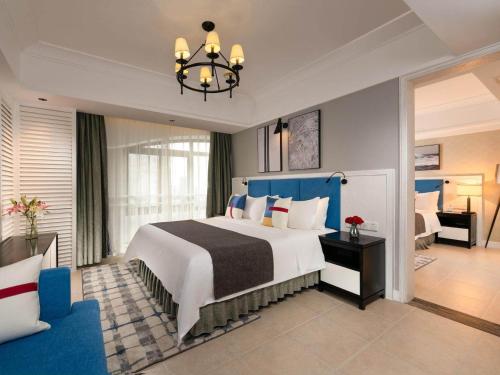 Imagen de la habitación del Hotel Park Inn by Radisson Beihai Silver Beach Wanda Plaza. Foto 19