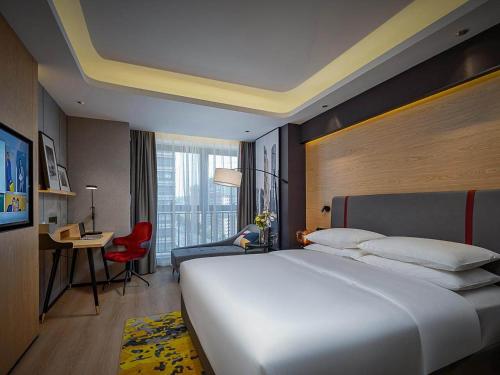Imagen de la habitación del Hotel Park Inn by Radisson Chongqing Yuelai International Expo Center. Foto 16