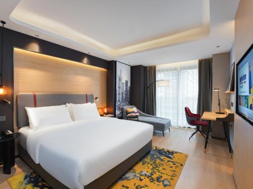 Imagen de la habitación del Hotel Park Inn by Radisson Chongqing Yuelai International Expo Center. Foto 17