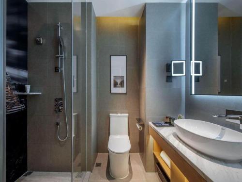 Imagen de la habitación del Hotel Park Inn by Radisson Chongqing Yuelai International Expo Center. Foto 18