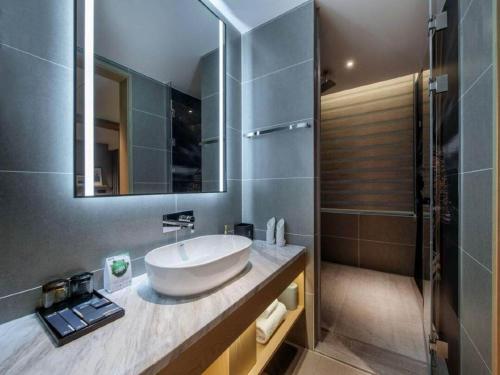 Imagen de la habitación del Hotel Park Inn by Radisson Chongqing Yuelai International Expo Center. Foto 20