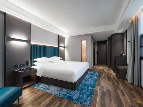 Imagen general del Hotel Park Inn by Radisson Hanzhong Central Square & High speed rail station. Foto 5