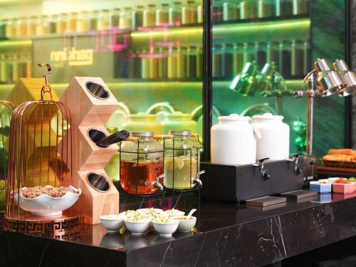 Imagen general del Hotel Park Inn by Radisson Hanzhong Central Square & High speed rail station. Foto 10